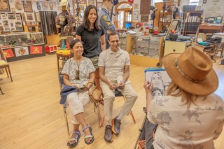 family posing for caricature portrait